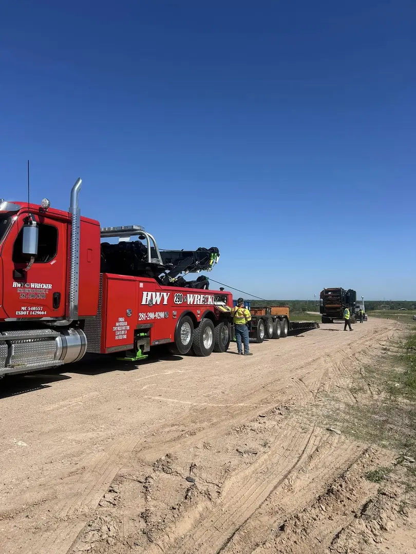 290 Wrecker Service heavy-duty tow truck on Highway 290 near Hockley TX
